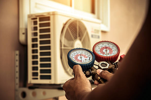 Professional Heat Pump Repair technician working in Summerville, GA